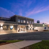 Front view of the Dot Foods Georgia distribution center and office at dusk