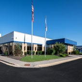 Front view of the Dot Foods Chicago distribution center and office at dusk